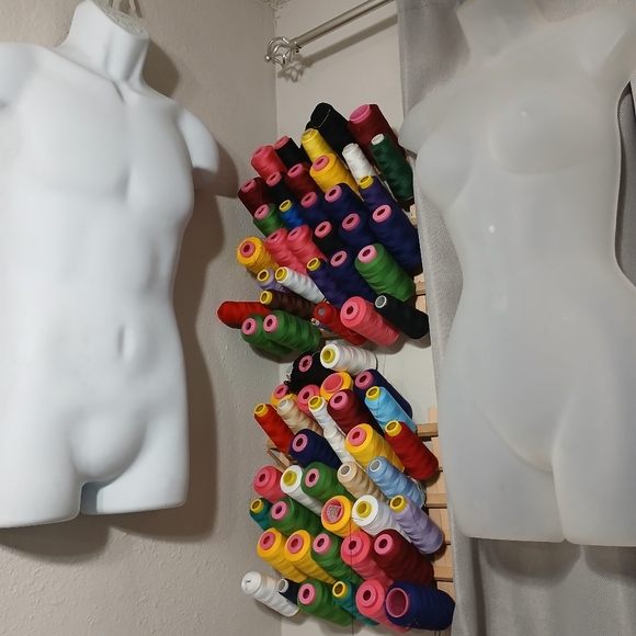 Sewing thread and plastic mannequin